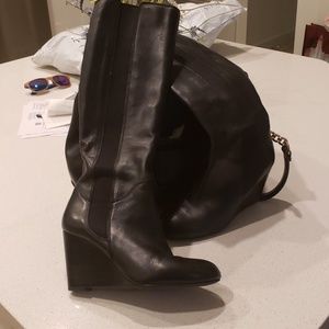 Knee high leather boots with wedge heel